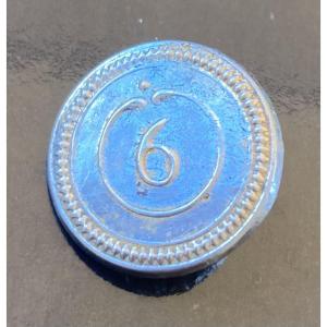 Bouton petit module de 17 mm , Officier du 6éme Régiment de Dragon. Premier Empire.