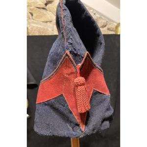 BONNET DE POLICE D’ARTILLERIE À CHEVAL. Premier Empire.