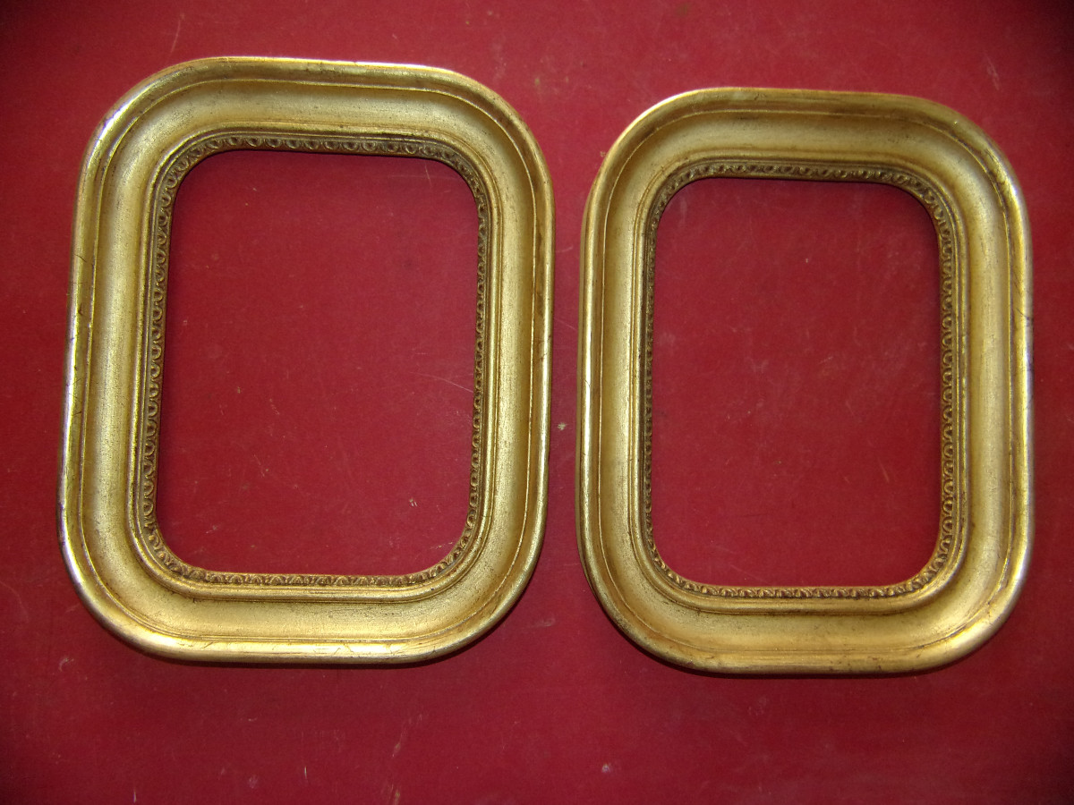 Paire de cadres époque 19ème, en bois doré.