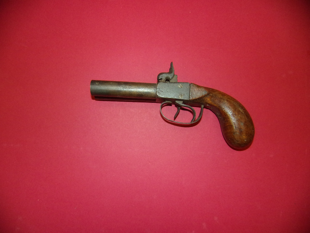 Pistolet percussion à double canon, époque 19ème.