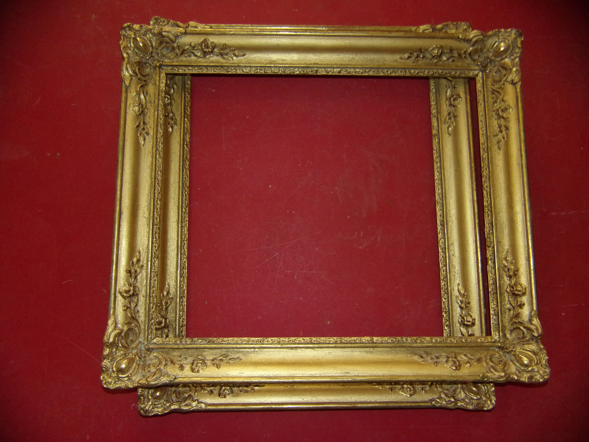 Paire de cadres époque 19ème, en bois doré.