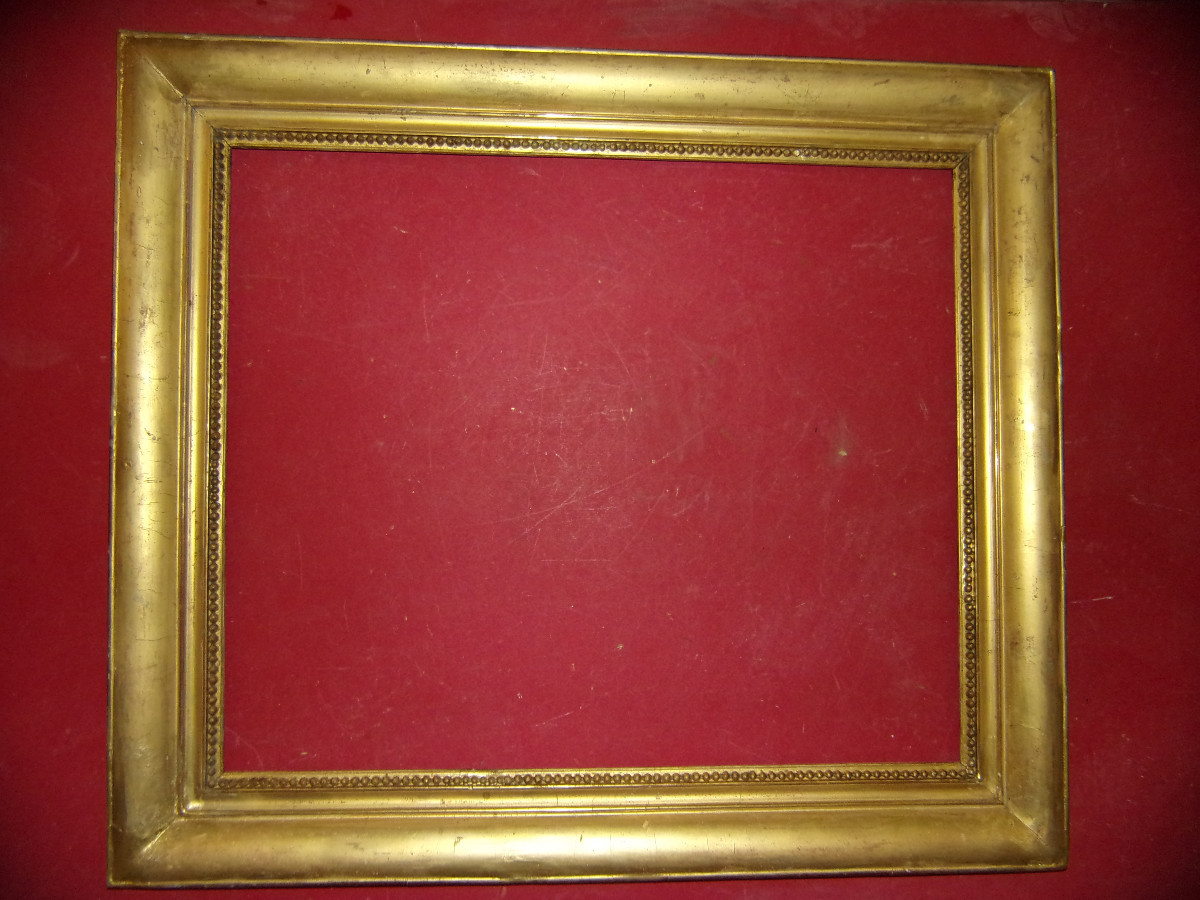 Cadre époque 19ème, en bois doré.