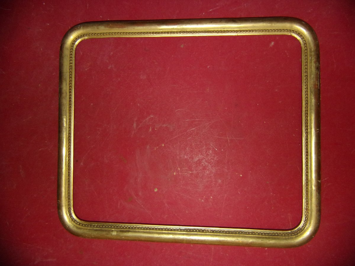 Cadre époque 19ème, en bois doré.