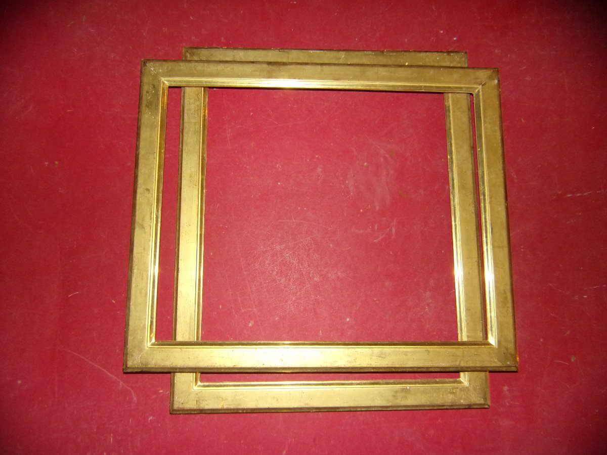 Paire de cadres époque 19ème, en bois doré.