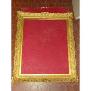 Cadre époque 20 ème, style Louis XIV, en bois doré.