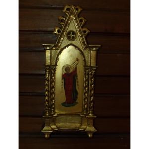 Petit ange musicien à la trompette, Peinture sur bois dans un cadre doré, 19 ème.