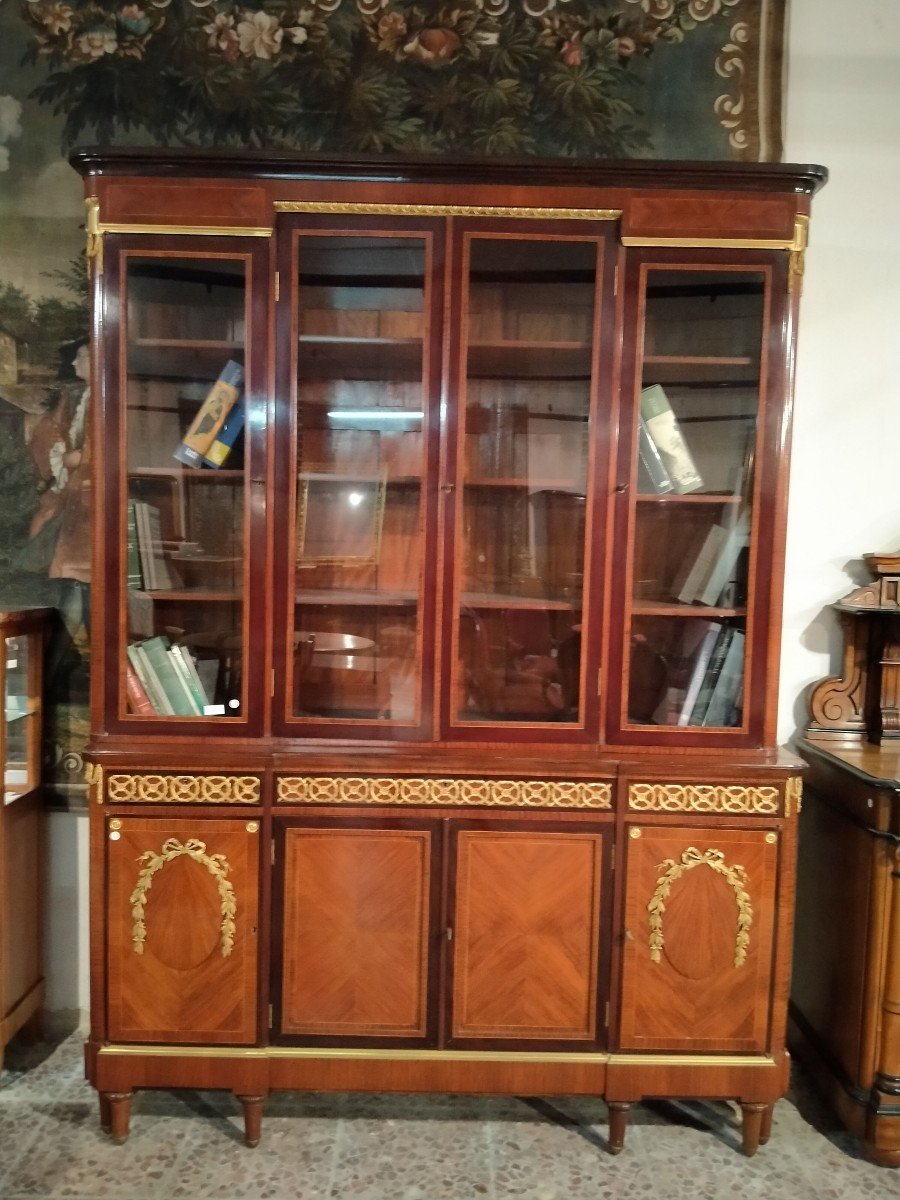 Beautiful And Elegant Bookcase With Four Glass Doors At The Top And Four Closed Doors -photo-3