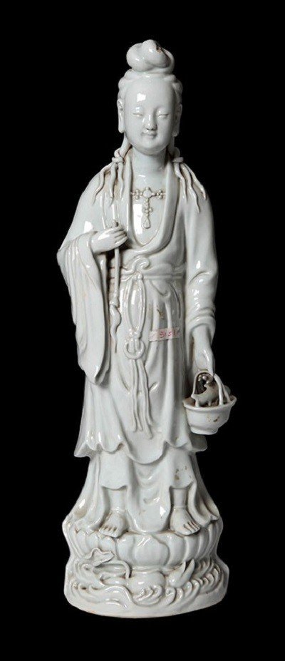 Chinese White Porcelain Sculpture From The Late 1800s Of A Young Woman Holding A Basket With 