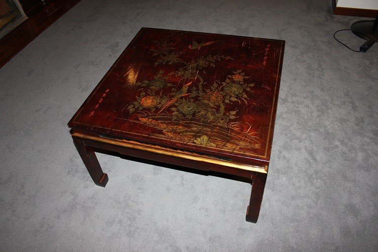 Low Chinese Coffee Table From The Early 1900s, Lacquered Wood. It Features A Top Decorated -photo-2