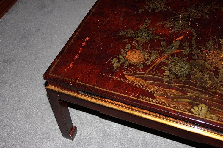 Low Chinese Coffee Table From The Early 1900s, Lacquered Wood. It Features A Top Decorated -photo-4