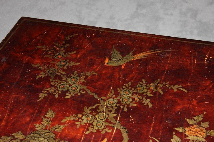 Low Chinese Coffee Table From The Early 1900s, Lacquered Wood. It Features A Top Decorated -photo-1