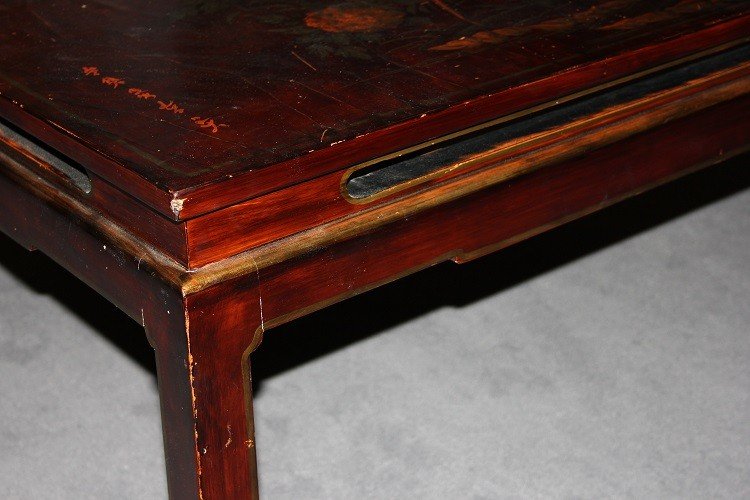 Low Chinese Coffee Table From The Early 1900s, Lacquered Wood. It Features A Top Decorated -photo-3