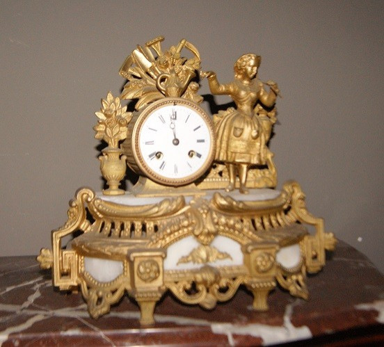 French Table Clock From The Second Half Of The 19th Century In Gilded Metal With A Marble Top, 