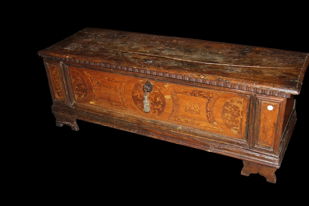 Large Italian Chest From Veneto, 1600s, In Walnut Wood. Features A Front Panel Adorned 