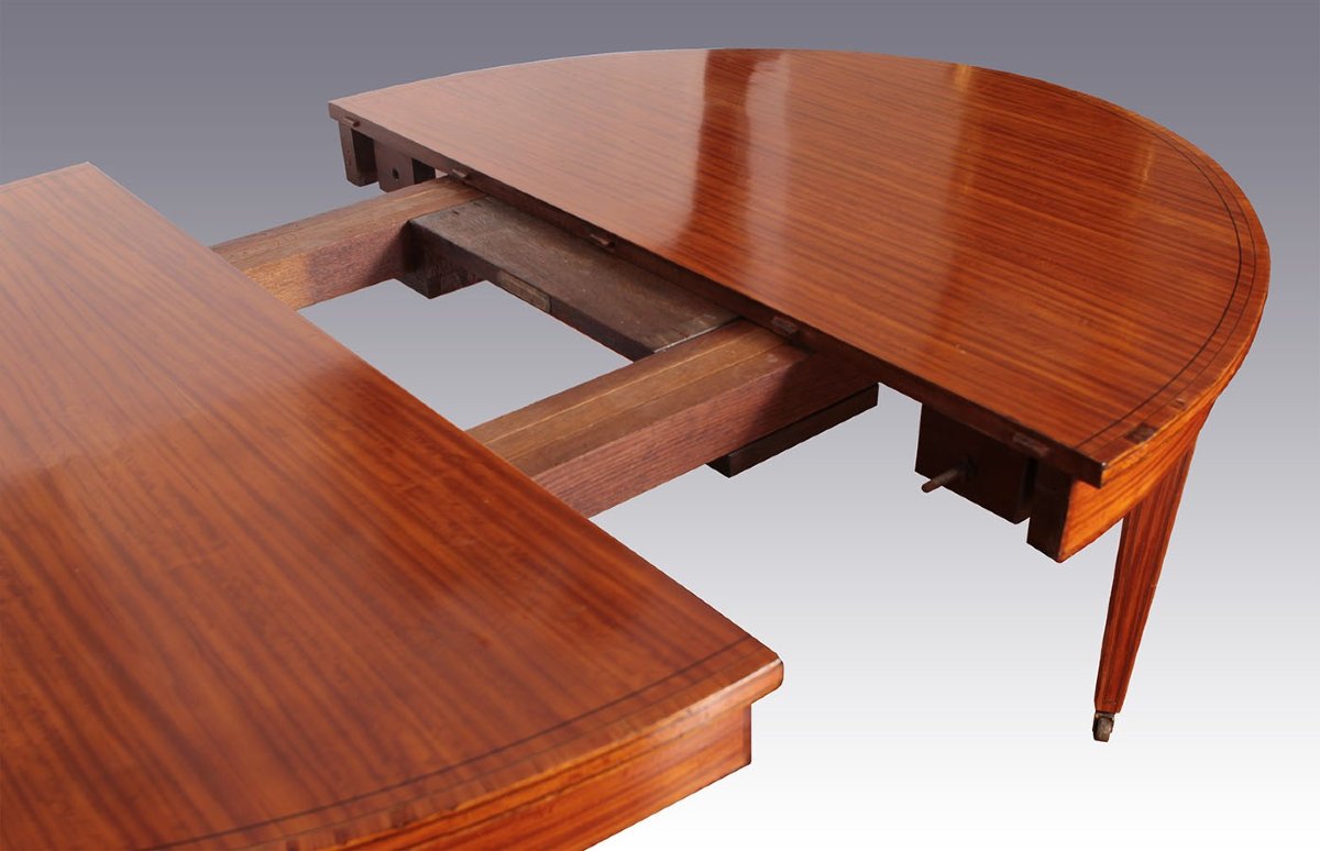 Extendable Oval Table In Satin Wood With Inverted Pyramid Legs That Rest On Metal Wheels-photo-3