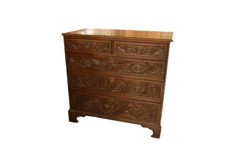 Richly Carved English Chest Of Drawers, From The First Half Of The 1800s In Tudor Style