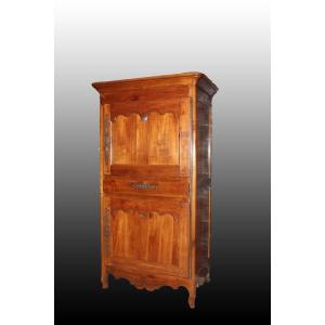 French Cherry Wood Cabinet From The Mid-1800s With 2 Closed Doors And A Drawer.