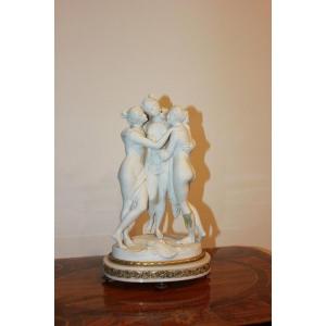 French Sculptural Group From The Late 1800s Depicting Venuses. It Features A Base Enriched