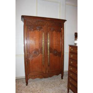 French 2-door Wardrobe From The Late 1700s, Normandie Style, In Oak Wood. It Features Doors And