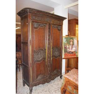 French Normandy 2-door Walnut Wardrobe With Carved Motifs