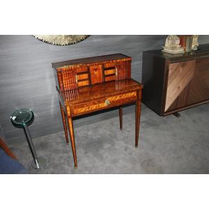 Small French Writing Desk From The Early 1800s, Richly Inlaid In The Louis XVI Style