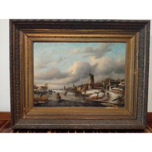 Oil On Canvas Depicting A Landscape With A River Enriched With Figures On Skates And Sleds