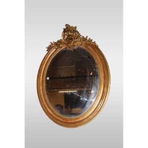 Oval French Gilded Mirror With A Cornice