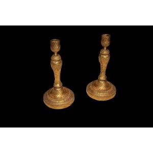 Pair Of Gilded Bronze Candlesticks With A Torchon Design