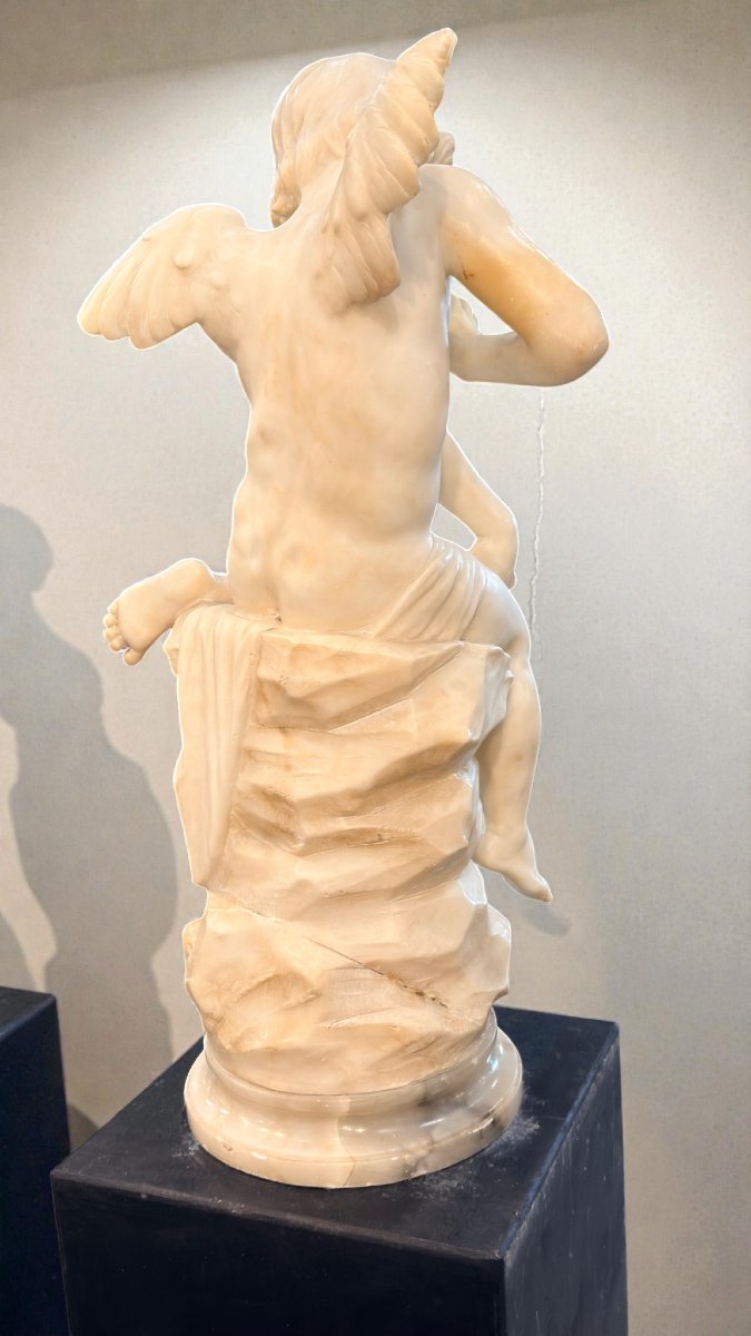 Statue Young Cherub Playing With Butterfly -photo-5