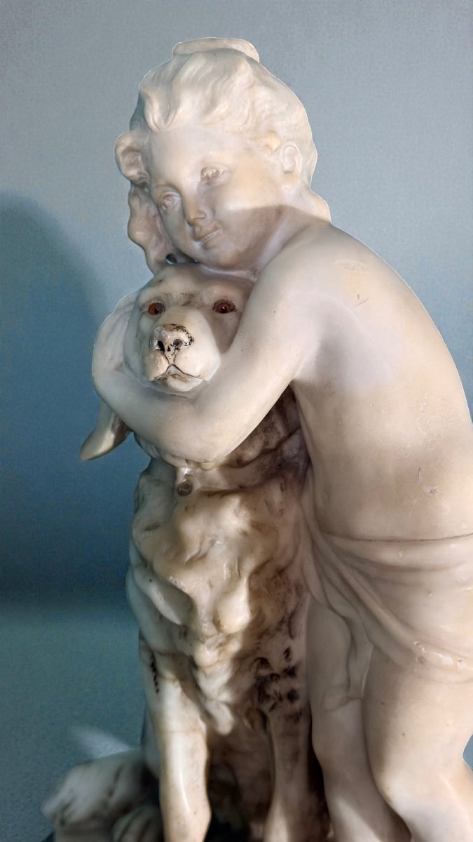 Statue Depicting A Young Girl Affectionately Hugging Her Little Dog Marble -photo-2