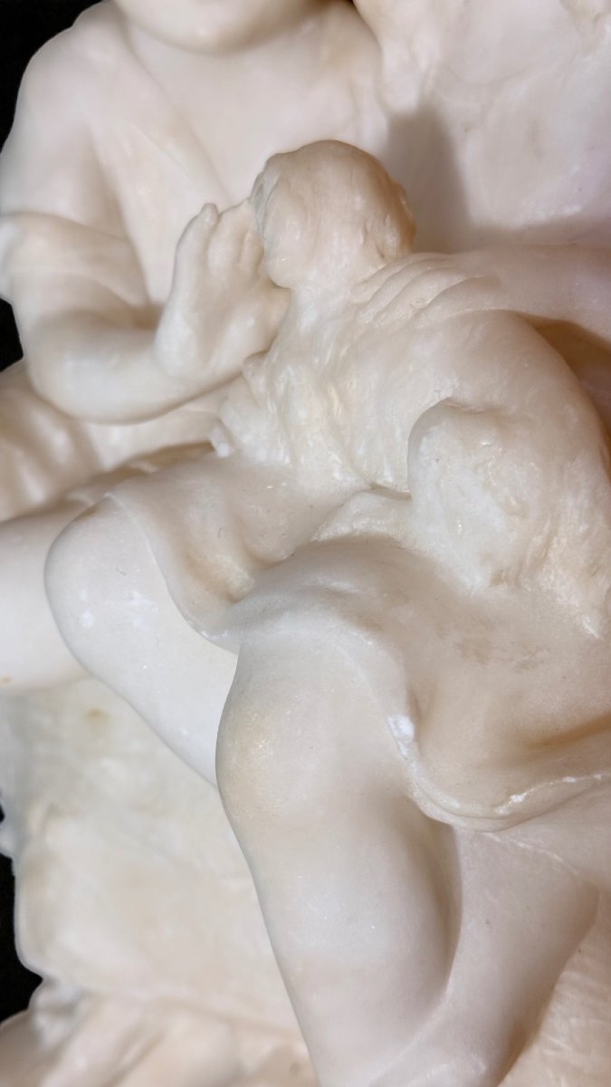 Statue Depicting Pair Of Children Playing With A Little Dog-photo-3