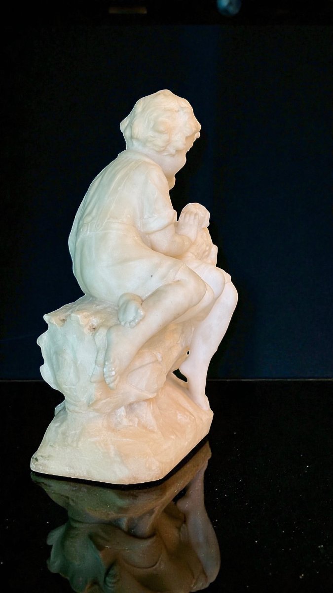 Statue Depicting Pair Of Children Playing With A Little Dog-photo-6