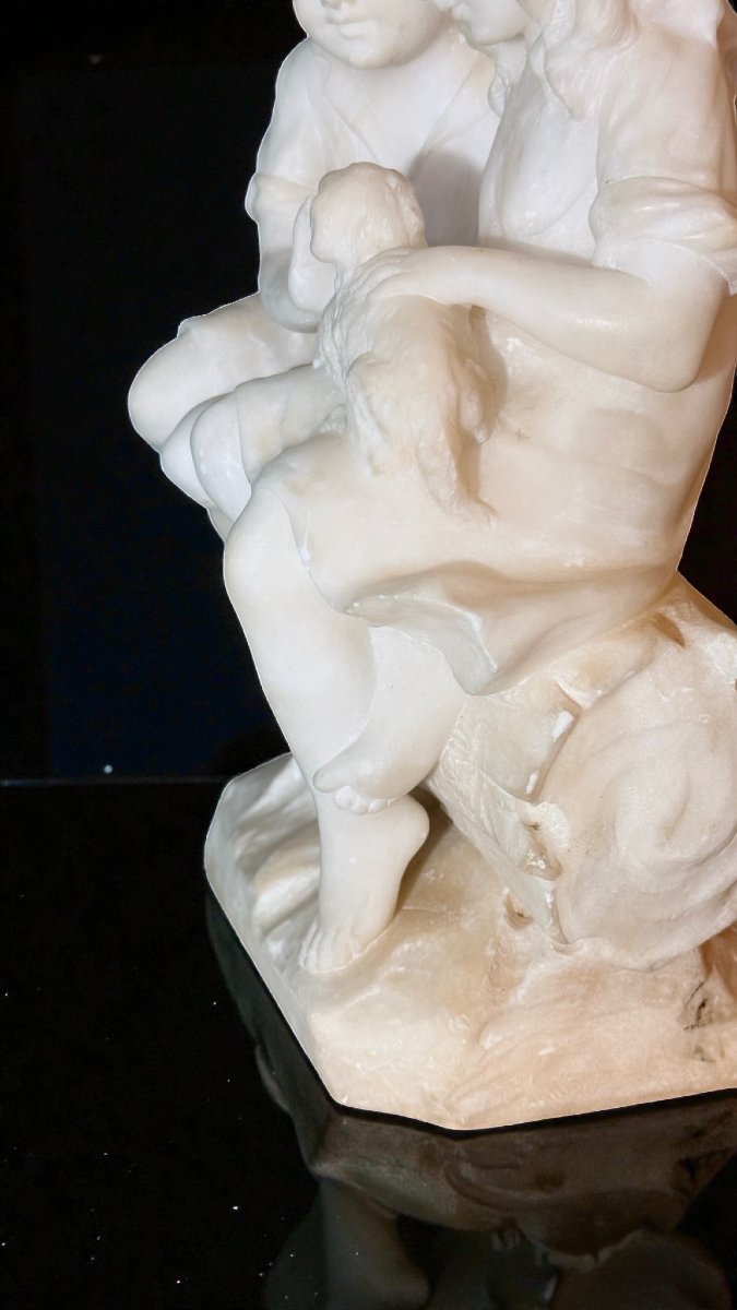 Statue Depicting Pair Of Children Playing With A Little Dog-photo-7