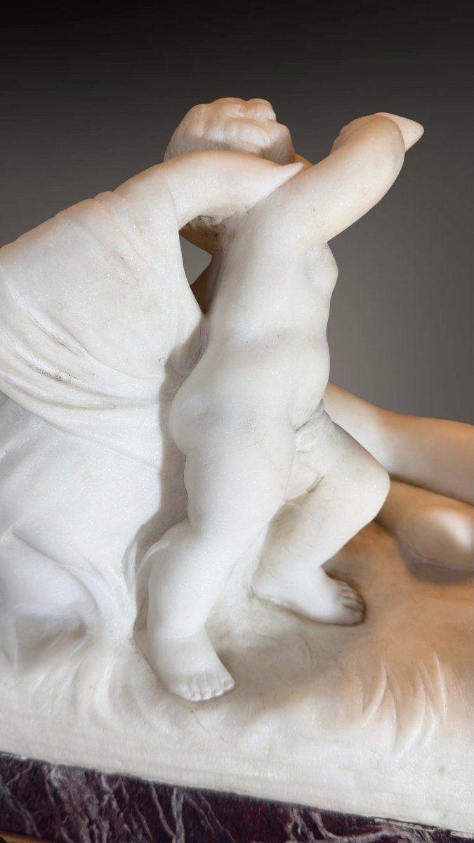 Statue Depicting A Young Girl With A Reclining Cherub, White Carrara Marble -photo-2
