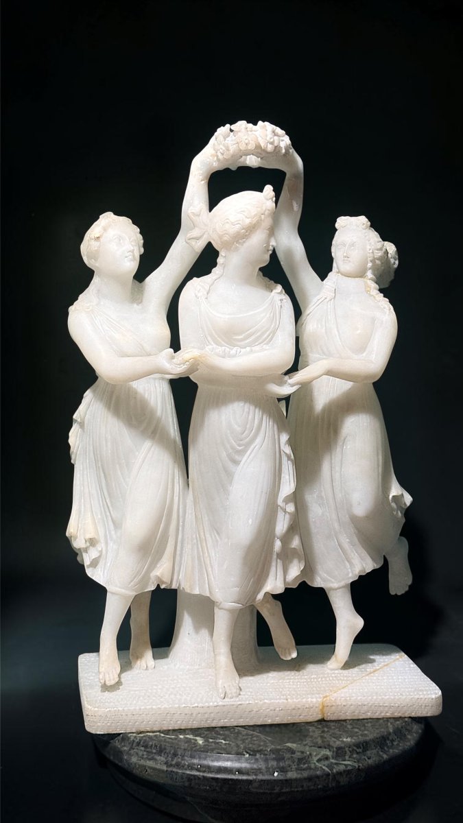 A Neoclassical Sculpture Depicting The Three Graces (or Charites) From Greek Mythology-photo-2