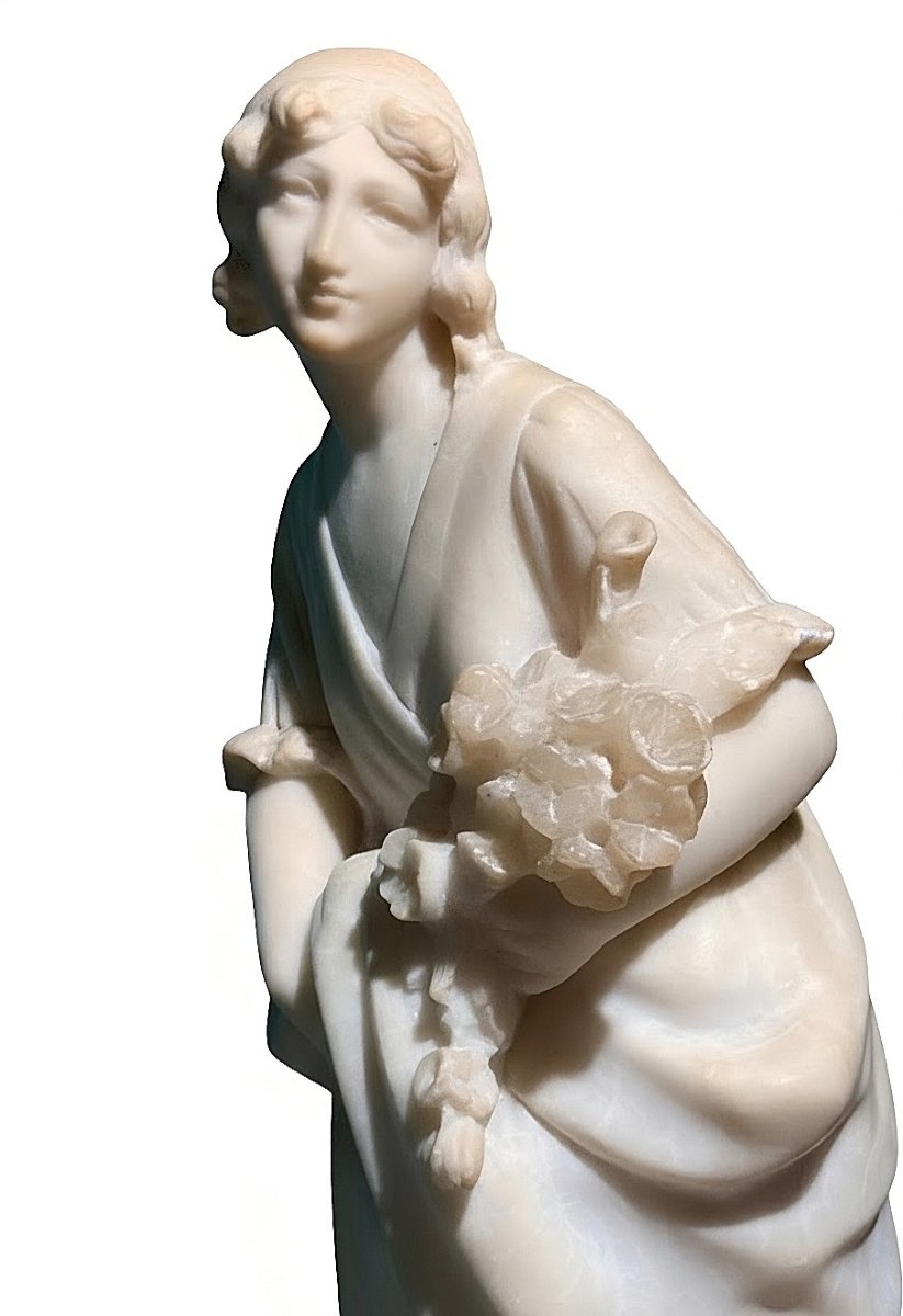 Statue Depicting A Little Girl With Flowers -photo-3