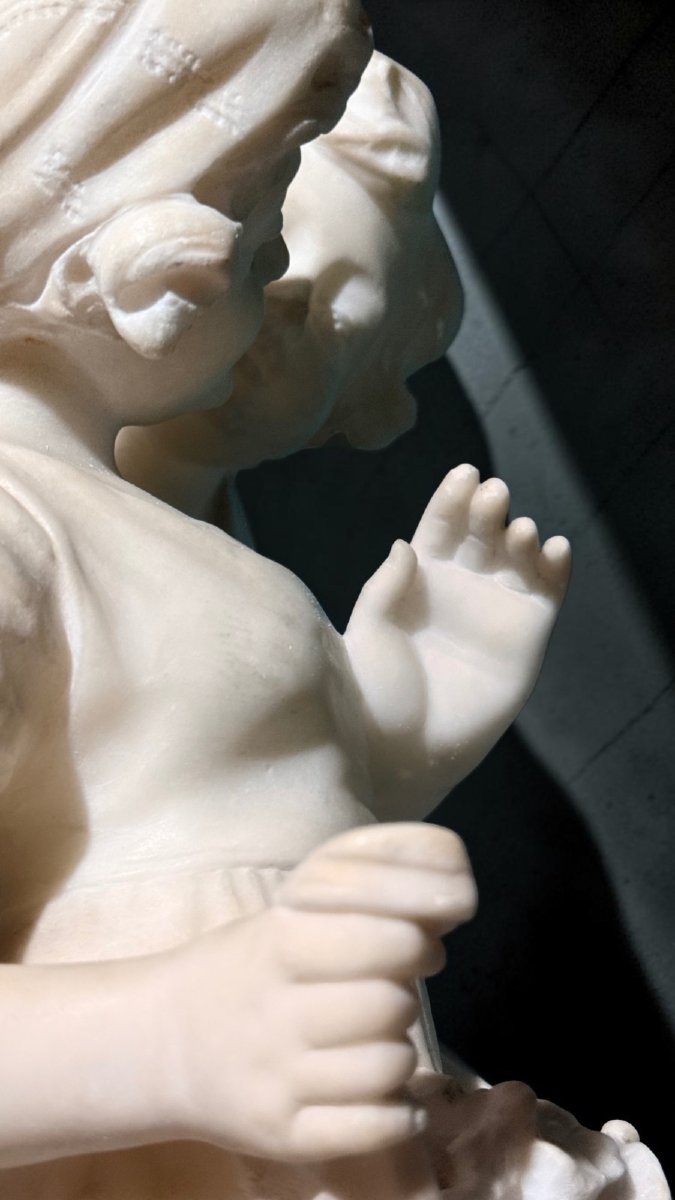 Statue Depicting A Young Couple Of Children -photo-4