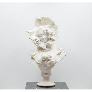 Bust Of A Girl Wearing A Hat