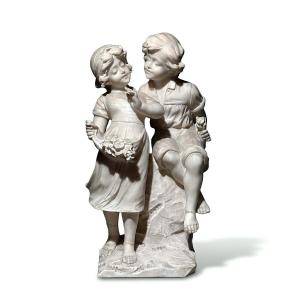 Statue Depicting A Young Couple Of Children 