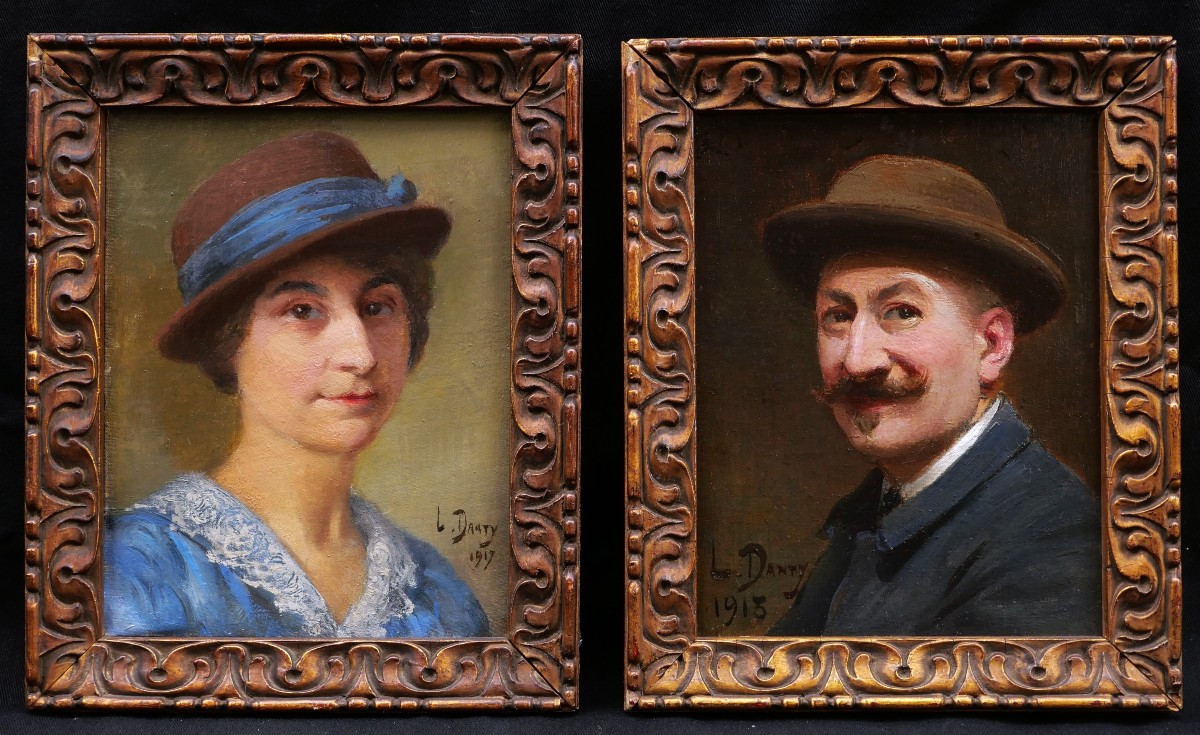 Léopold DANTY, Portraits d'un homme et d'une femme portant un chapeau