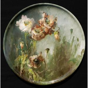 MONTIGNY-SUR-LOING, Manufacture BOUÉ ET PETIT, Plat rond à décor impressionniste de roses