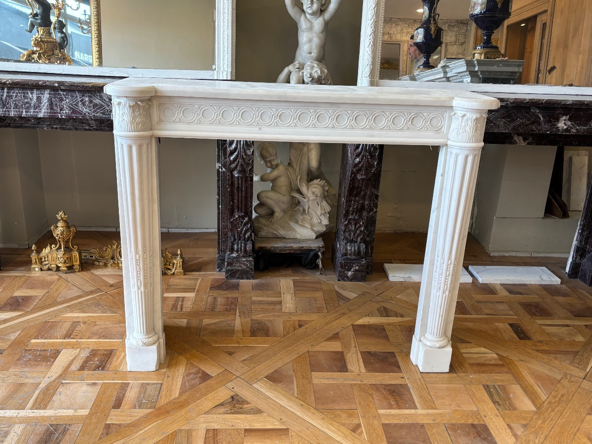 Antique Louis XVI Style Fireplace Made Of White Statuary Marble Dating From The 19th Century