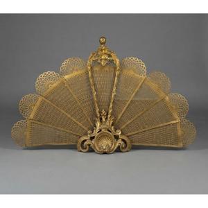 A Louis XV Style Gilt Bronze Fan-shaped Fire Screen Dating From The Late 19th Century