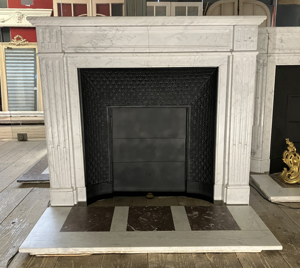 Antique Louis XVI Style Fireplace In Veined White Marble.