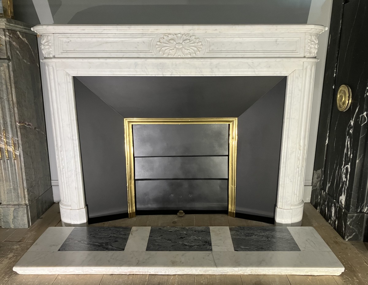 Antique Louis XVI Style Fireplace In White Veined Marble.