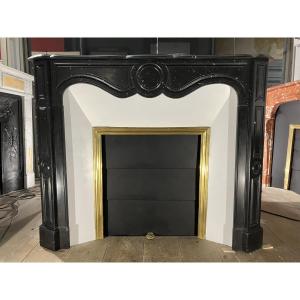 Cheminée Ancienne de Style LOUIS XV en marbre noir.