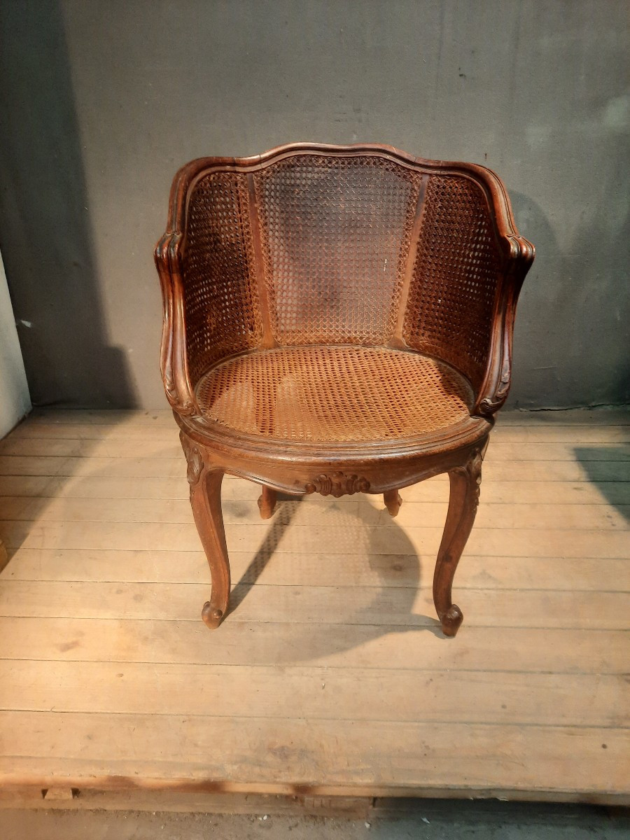 Fauteuil de burreau canné  style Louis XVI 