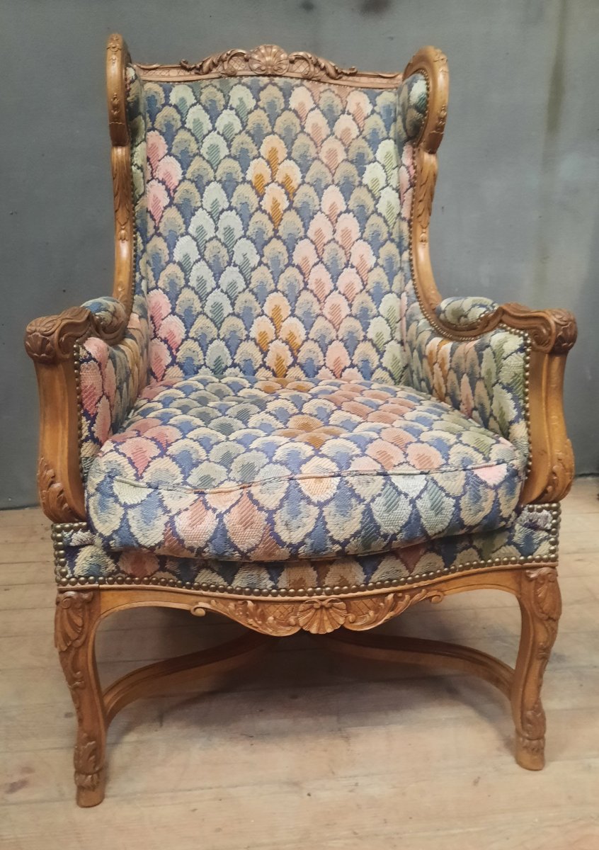 Bergere à oreilles en bois sculpté de style Louis XVI 