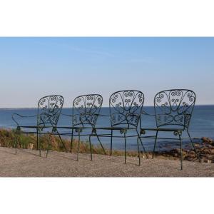 Série de 4 fauteuils de jardin en fer forgé, France, XXe siècle