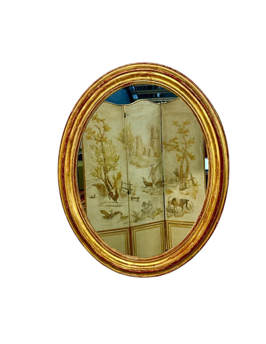 Grand miroir ovale en bois doré, France, XIXe siècle